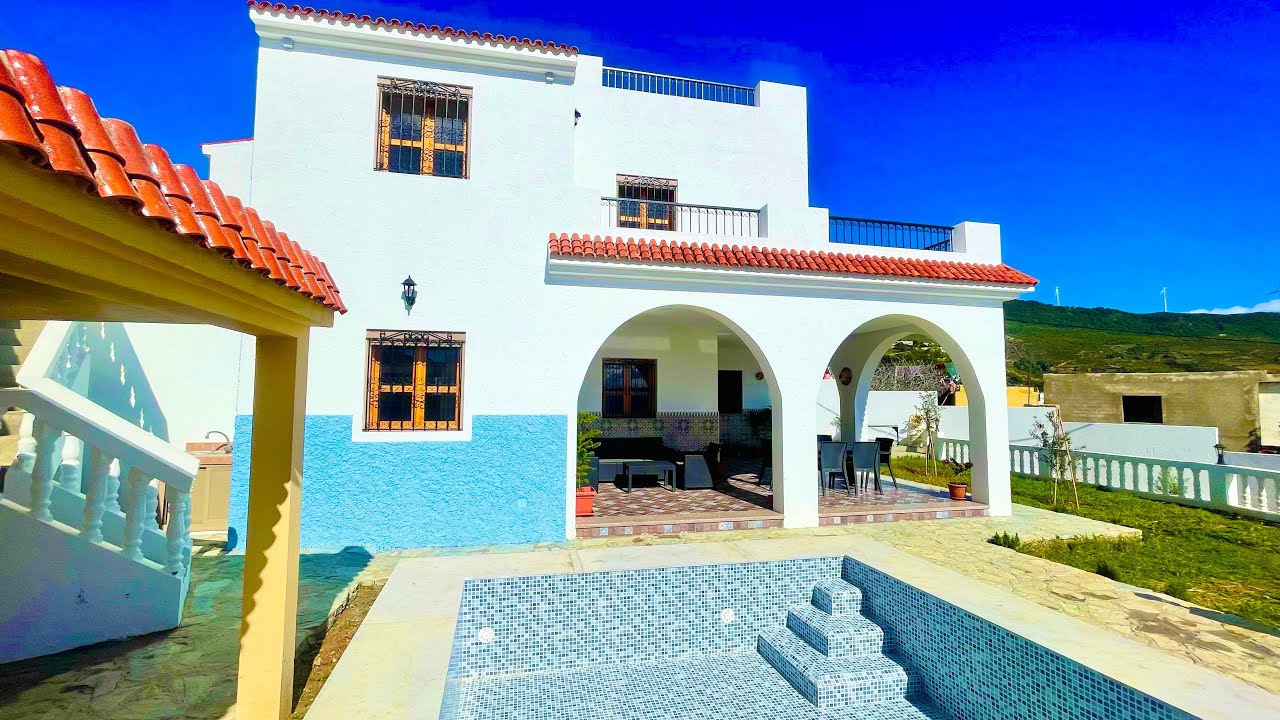 فيلا رائعة جدا ومجهزةومفججة مطلة على الطبيعة الخلابة مساحة 950متر0703640826ملوسة طنجة