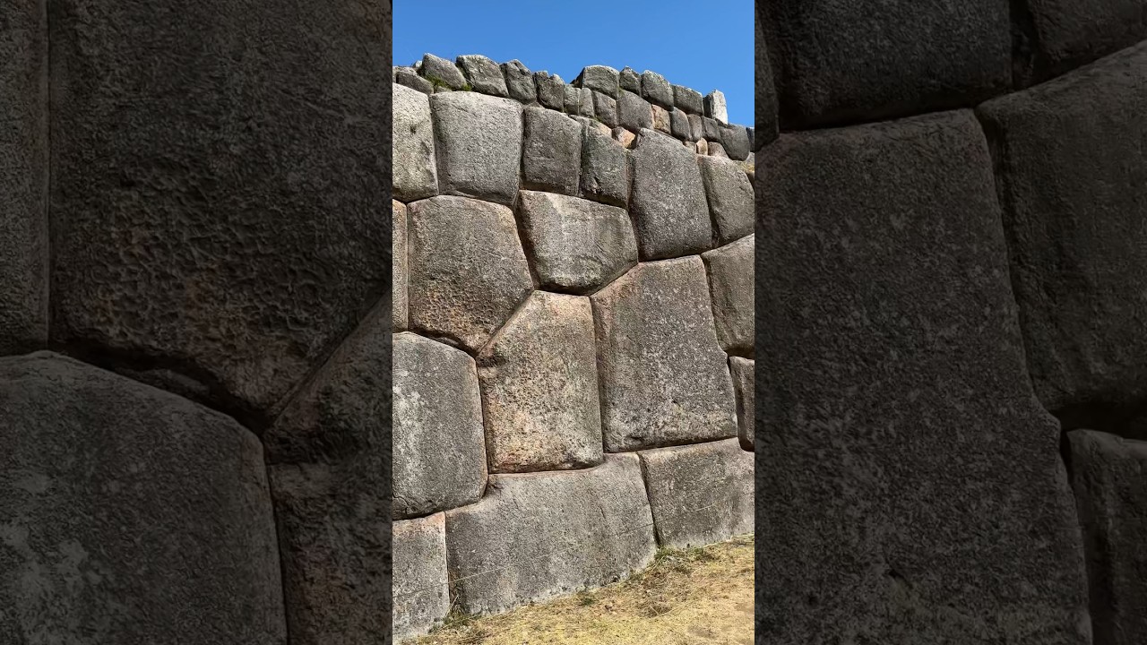 The interlocking stone wall of the Inca Saksaywaman citadel above Cusco Peru