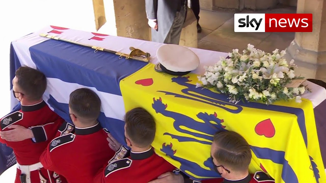 Prince Philip's coffin carried out of Windsor Castle