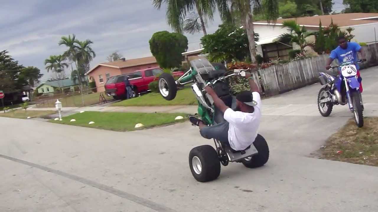 SNAP WHEEL STANDING A 4 WHEELER IN SLOW MOTION!! & SLOW DIRT BIKE!!