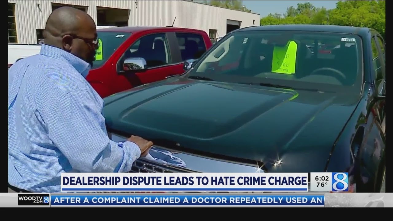 Dealership worker says woman hit him, used N-word