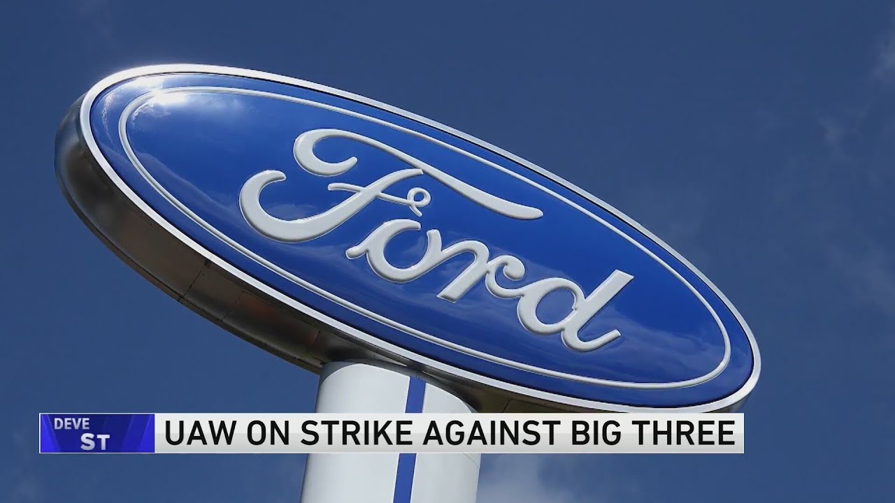Workers strike at all 3 Detroit automakers in a battle for a bigger share of industry profits