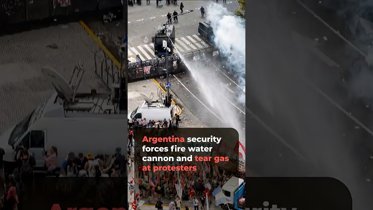 Argentinian security forces fire water cannon and tear gas at labour reform protesters