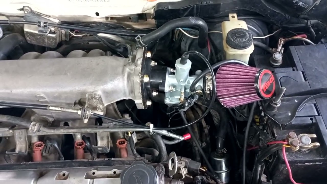 Auto con carburador de moto, un total éxito y super económico.