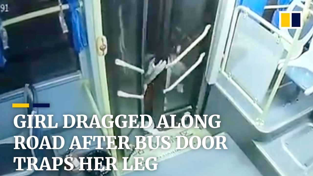 Girl in China dragged along road after bus door traps her leg
