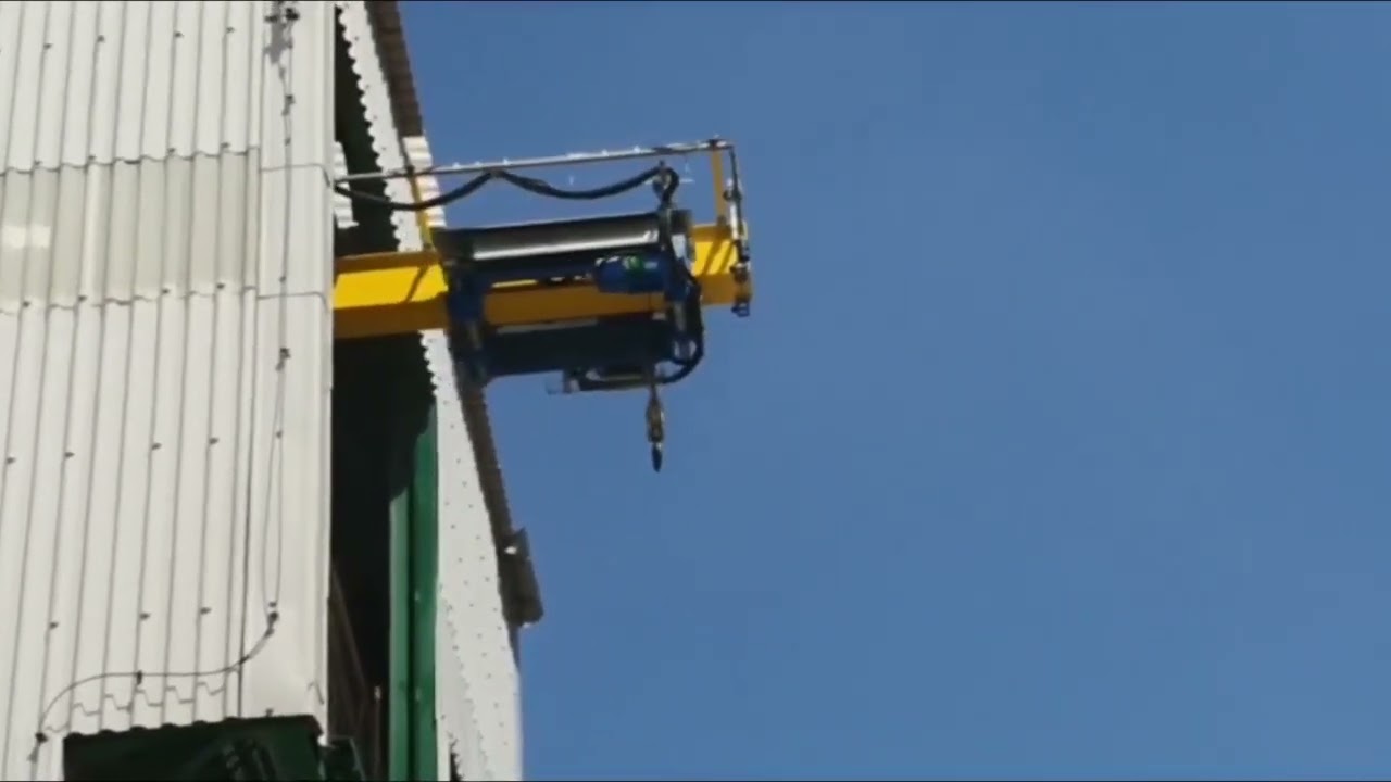 RETRACTABLE CRANE - Suspended beam moving under a single girder crane
