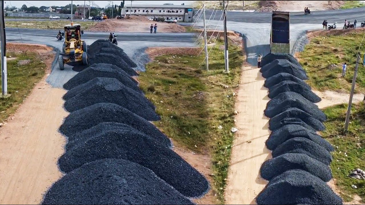 Amazing Motor Grader With 25T Dump Trucks Filling Gravel Coverage An Old Road In Village
