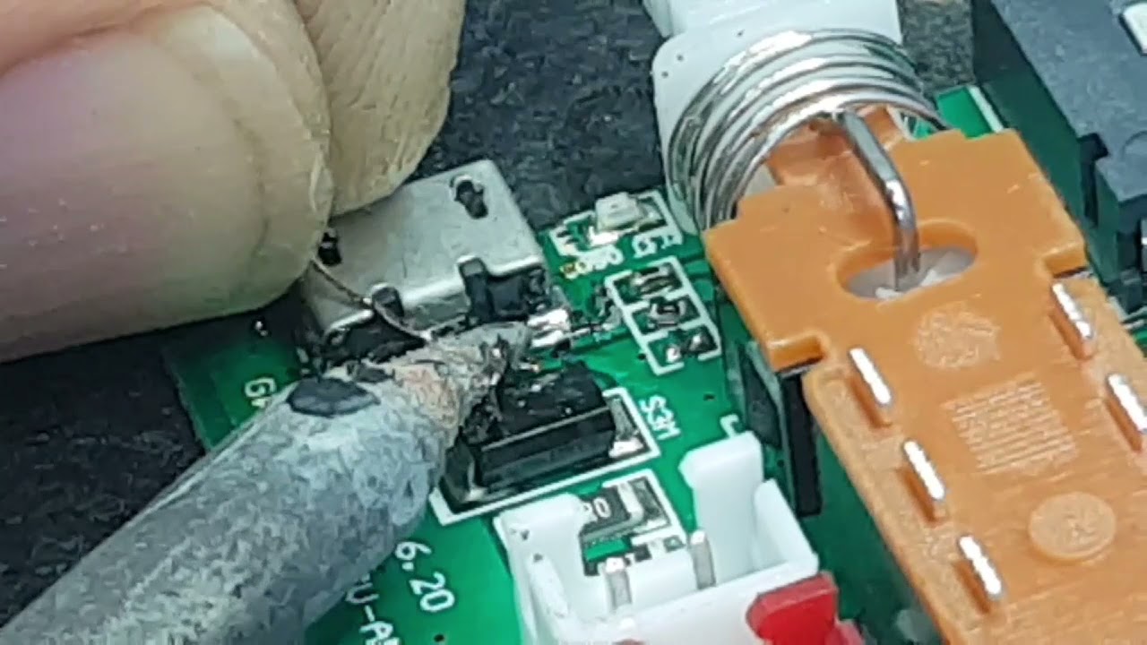 Caixinha de musica , reparo  conector  carga .