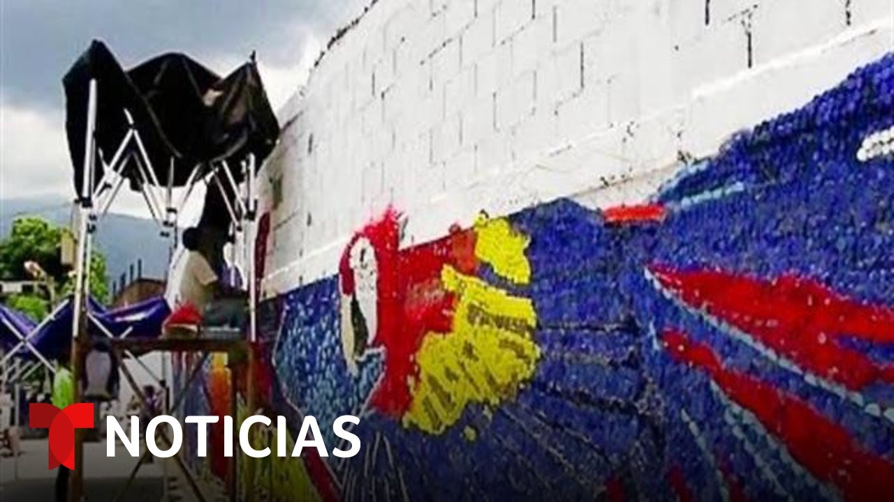 Construyen un enorme mural con tapas de plástico en Guatire, Venezuela | Noticias Telemundo