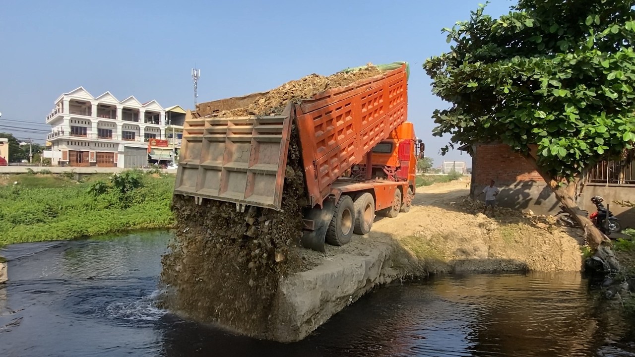Project! Dozer push Land Reclamation Project Underway Watch This Canal