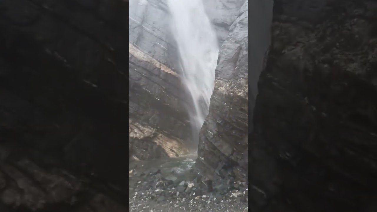 beautiful waterfall on the way of milam glacier trek.