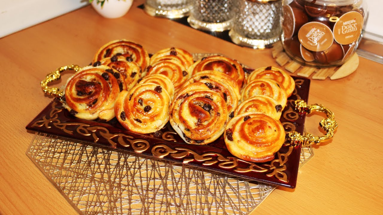 DELICIOSAS CARACOLAS CON CREMA PASTELERA I PASAS Y CHOCOLATE