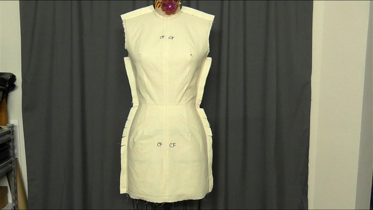 Correcting a sloper drape on the mannequin
