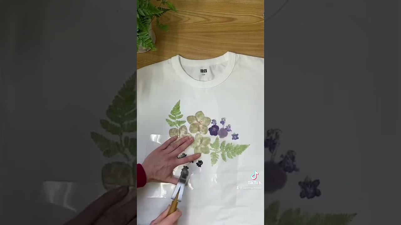 Eco print on a t-shirt. Hammered flowers