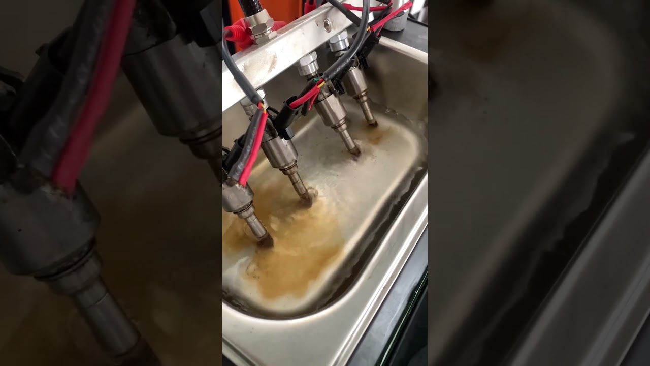 Ultrasonic cleaning of car fuel injectors