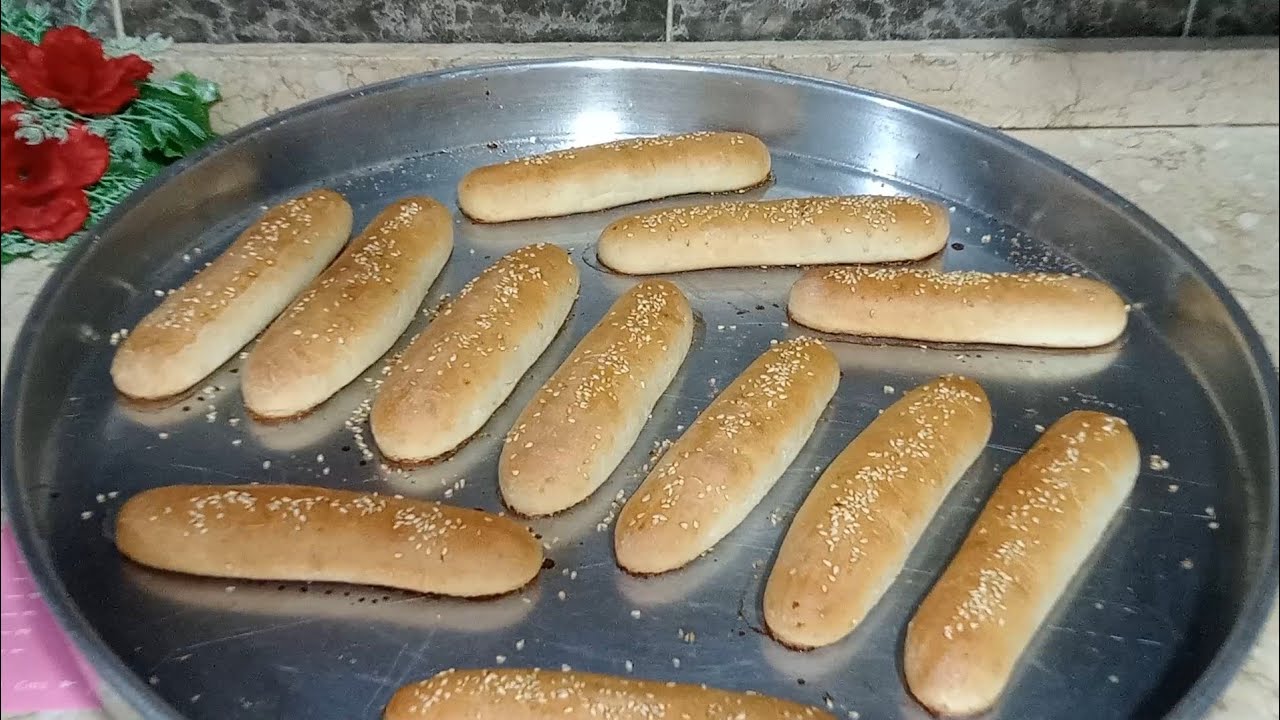 العيش الفينو بالميه والدقيق وفى نصف ساعةسهل وسريع واقتصادى جدا 