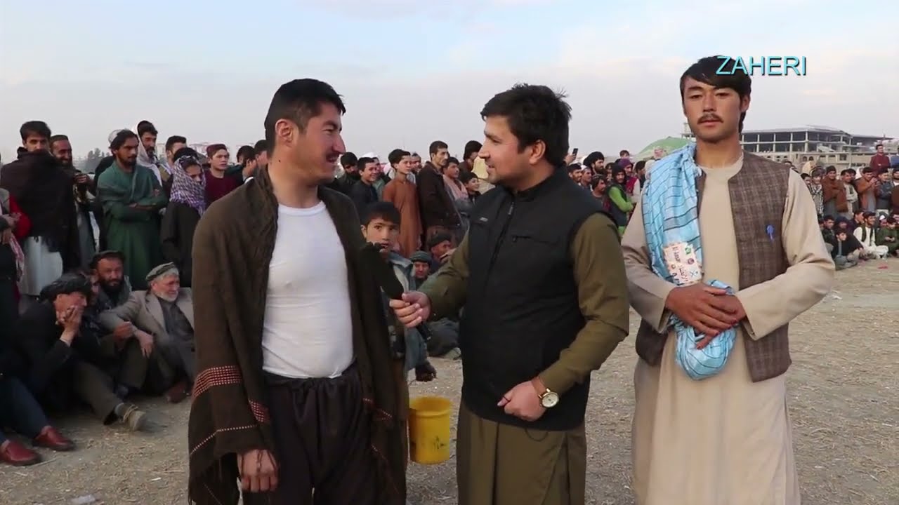 گزارش ویژه احمد نوید ظاهری مسابقه پهلوانی در چمن حضوری با پهلوانان ولایت های شمالی افغانستان قهرمان