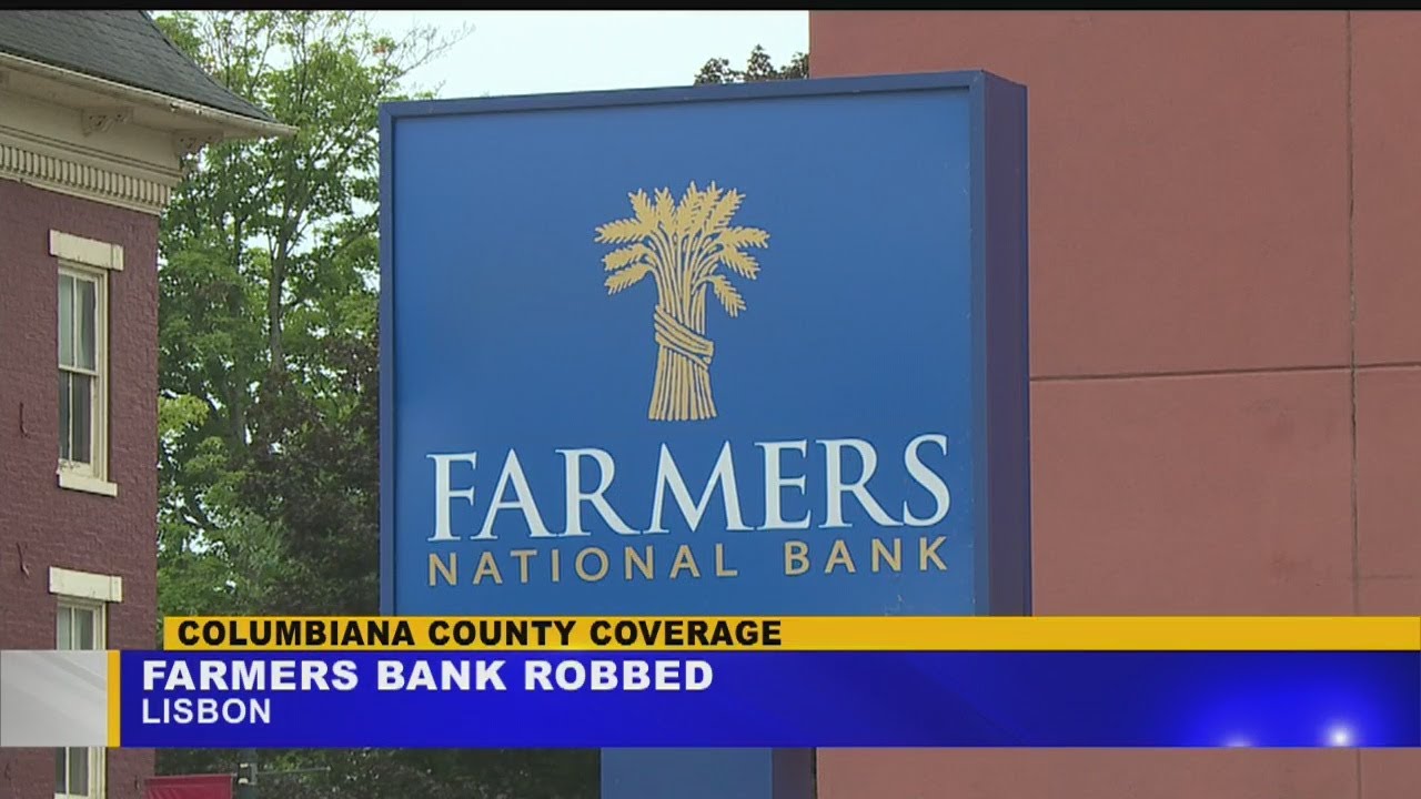 Lisbon police say bank robber removed hoodie from face when staff asked him to