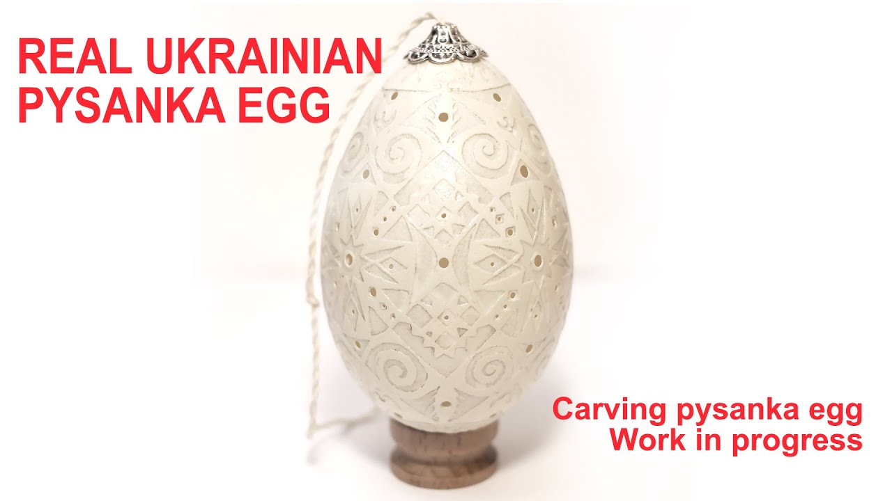 Carved Pysanka egg. Real ukrainian egg shell art. Wax painting goose egg. Work in progress