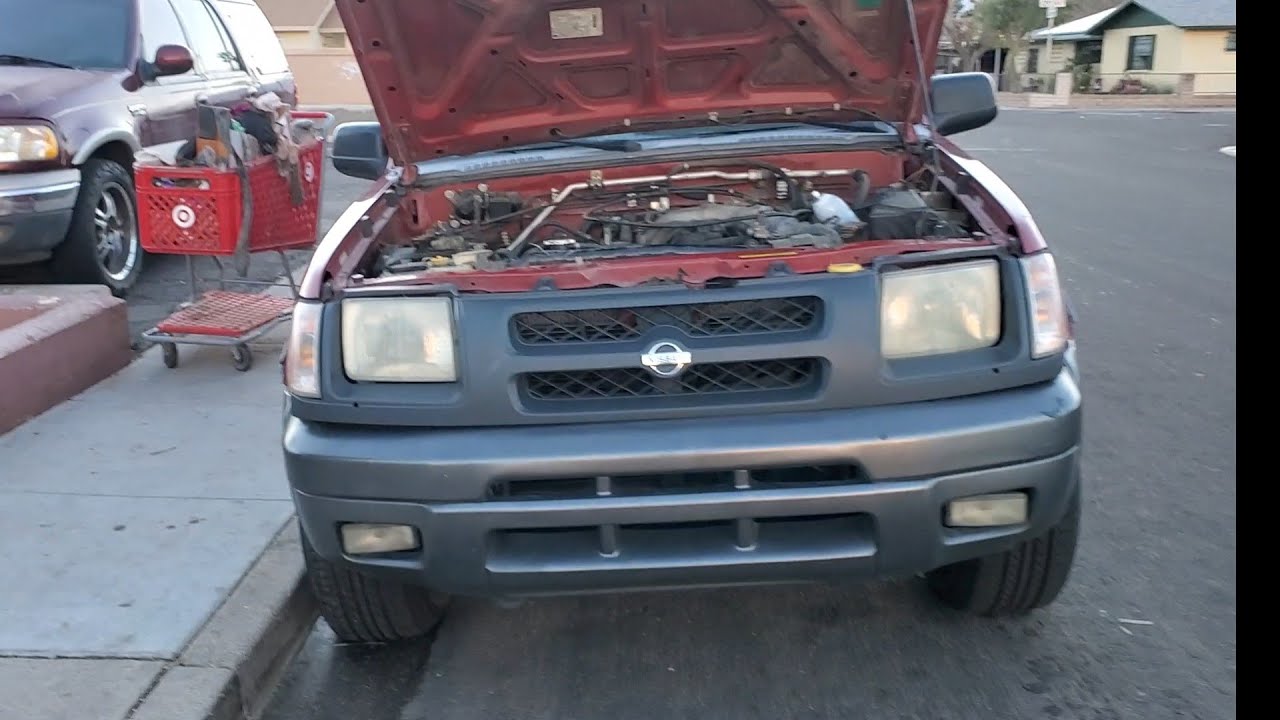 NISSAN XTERRA 2001 COMO CAMBIAR FILTRO DE GASOLINA