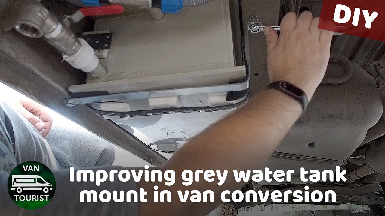 Improving grey water tank mount. My van conversion grey water tank mounting system.