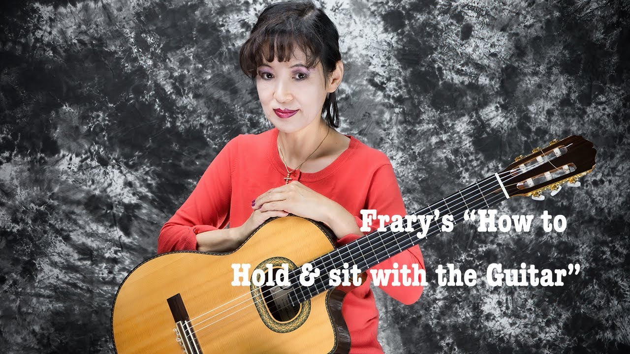 How to hold and sit with the Guitar