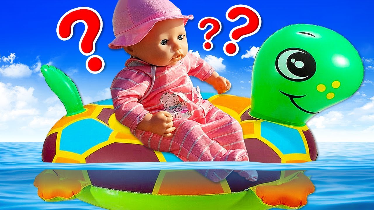 Baby Annabell doll playing with toys on a beach. Baby doll can't sleep! Baby Annabell doll videos.