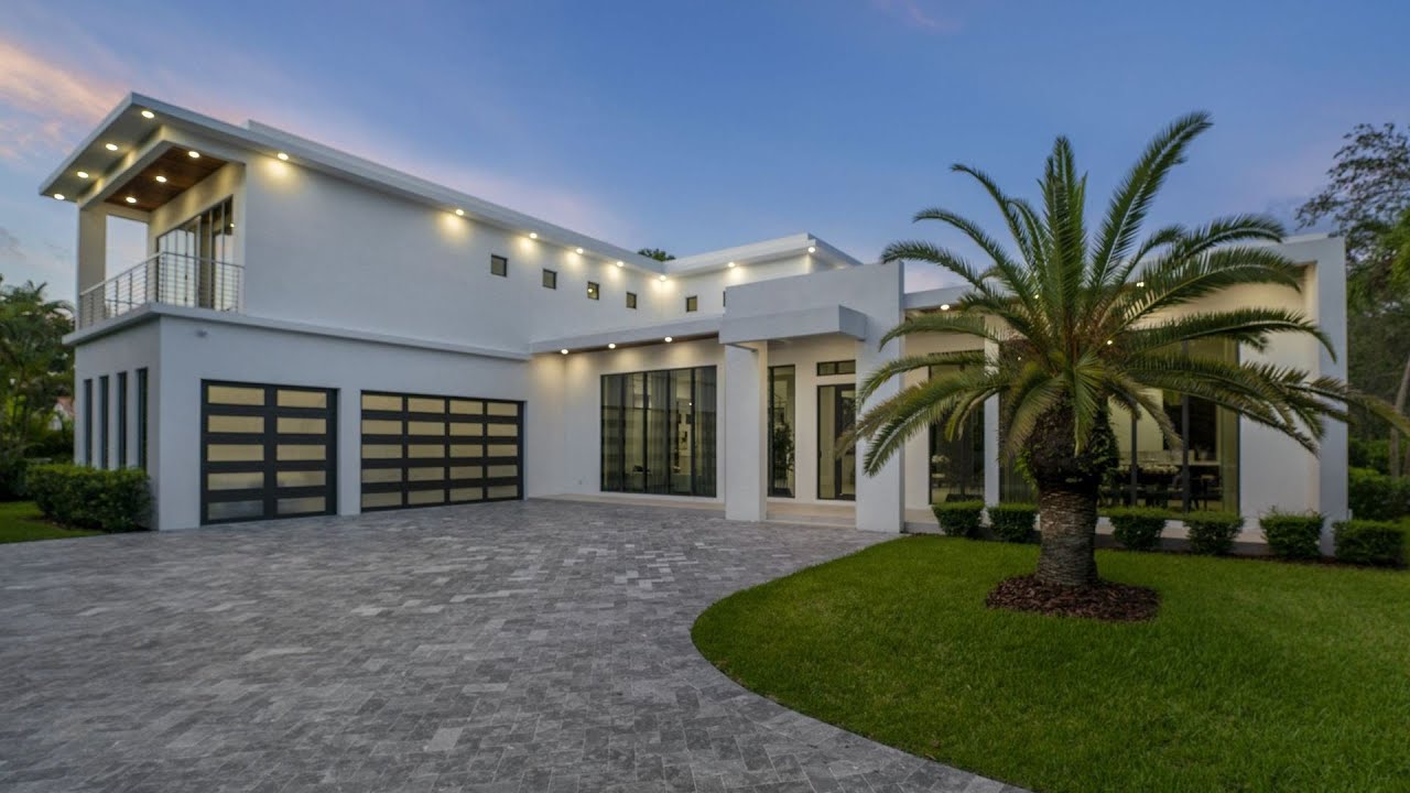 This $6,500,00 Spectacular modern smart Home in Pinecrest Florida has a gorgeous formal living room