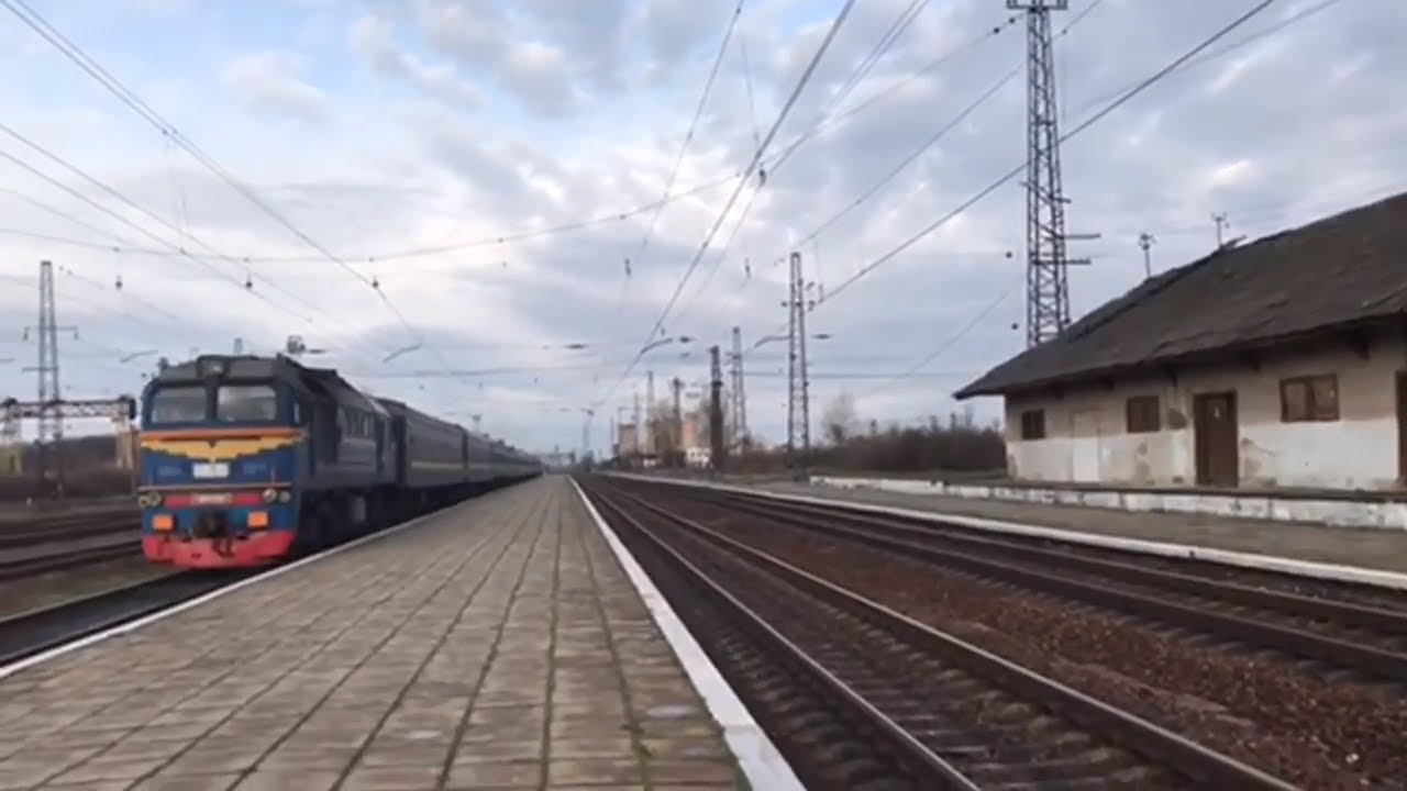 М62 з поїздом №13/14 Киів - Солотвино
