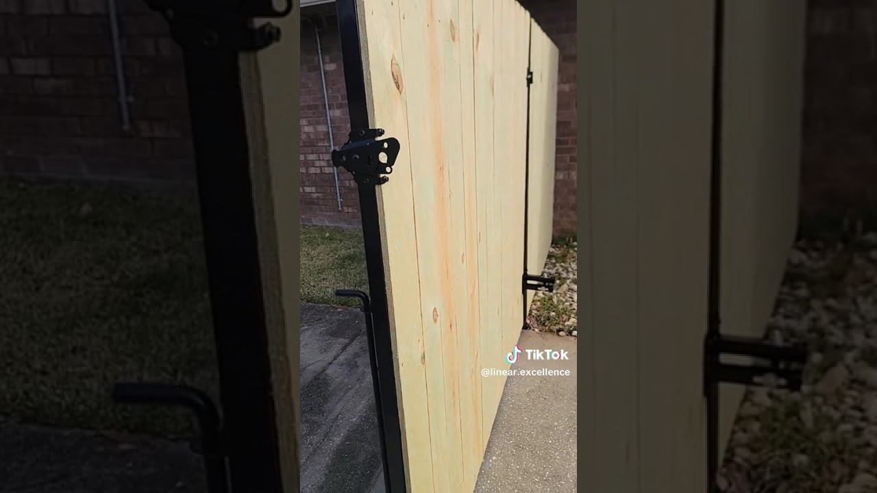 Sloped double drive gate, before the Swan Hinge and after.