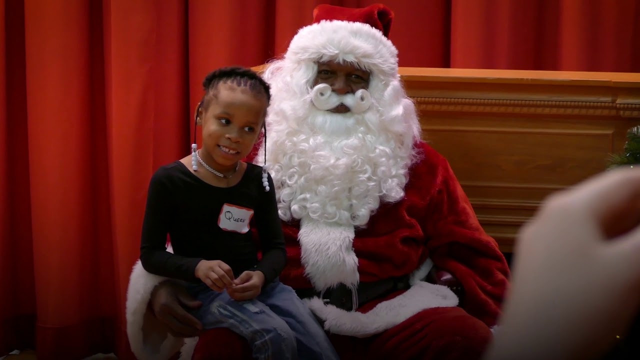 HomeFront kids meet Santa Claus at Pennington School party