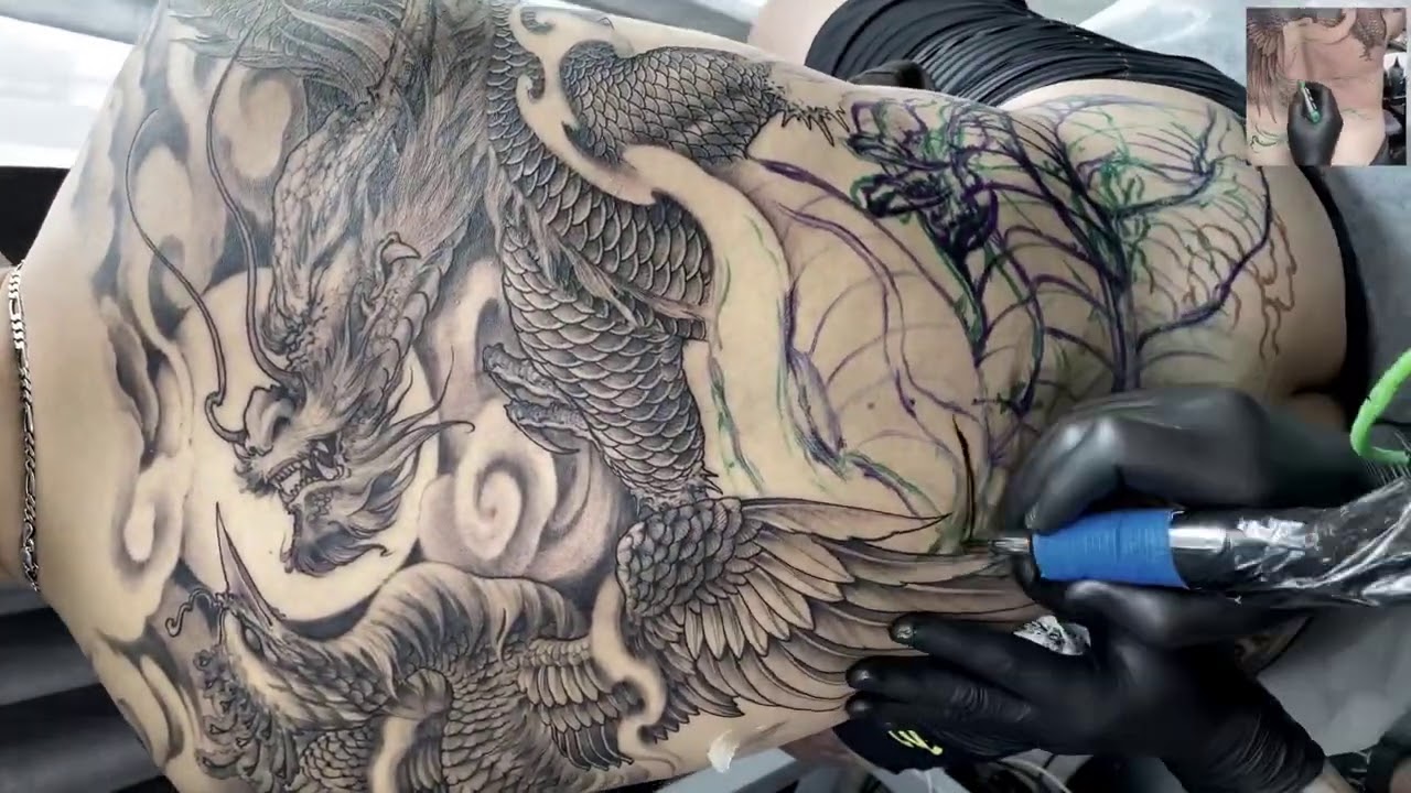 Dragon tattoo with Phoenix tattoo done by Trung Tadashi Artist ( Full back - freehand)