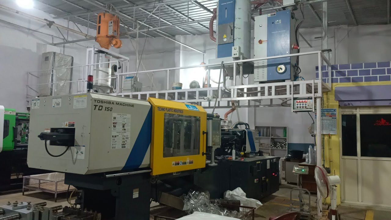 Toshiba machine TD 150 injection molding machine