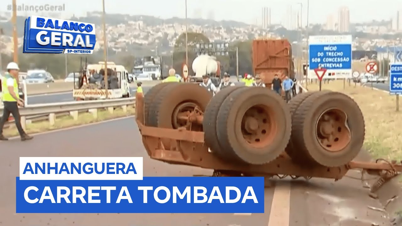 Carreta se solta de caminhão de cana e tomba em alça de acesso à rodovia de Ribeirão Preto (SP)