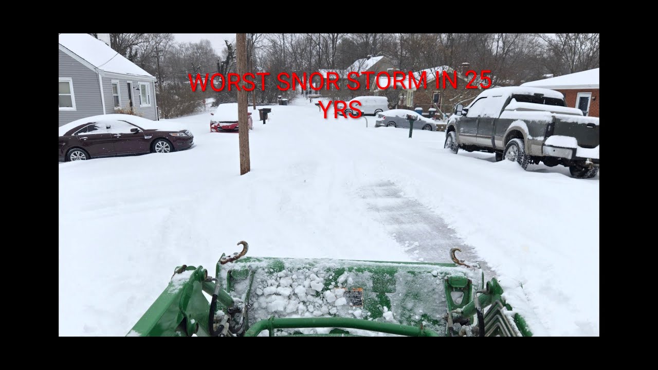 John Deere 1025R PLOWING SNOW