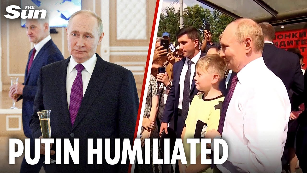 Sheepish Putin steps out to meet sailors after cancelling navy parade over 'security reasons'