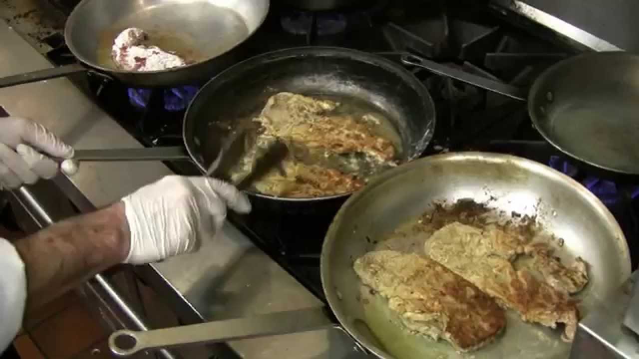 Chef prepares livers and onions