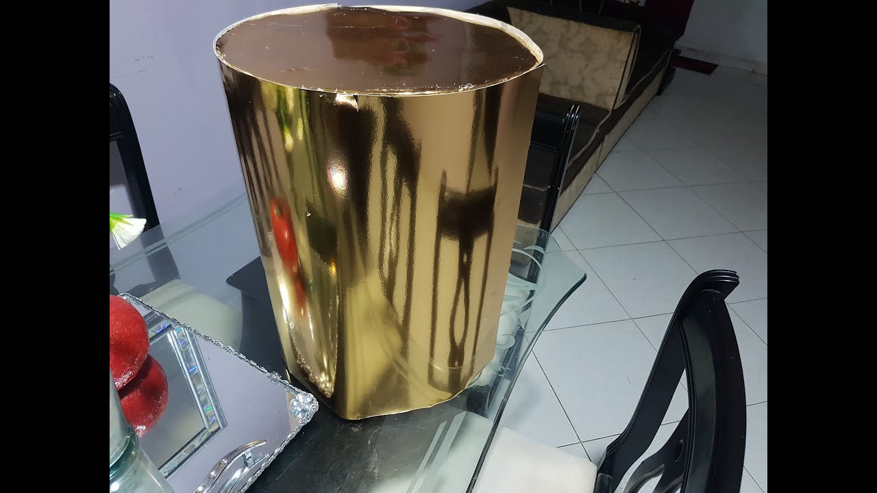 cilindro para decorar fiesta elaborado con material reciclado