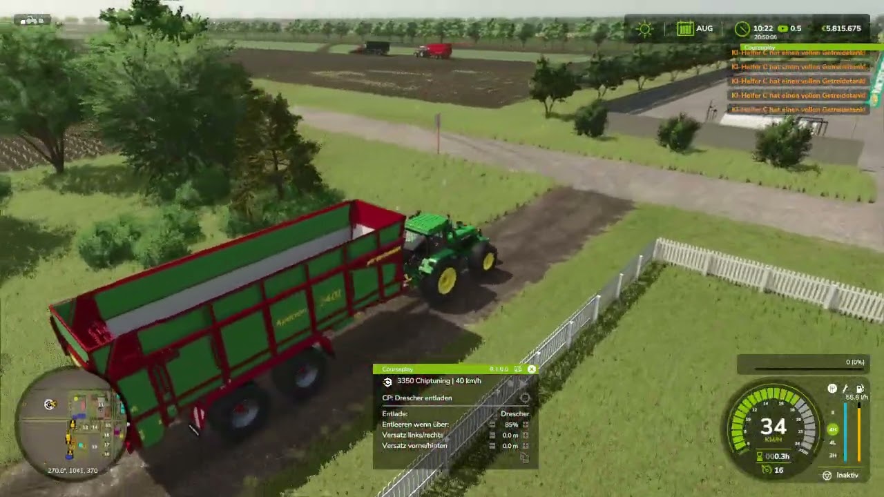 John Deere 3350  beim Mais abfahren