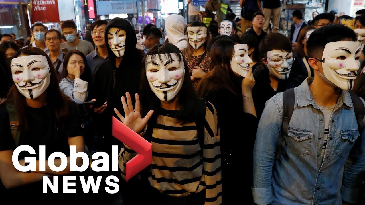 Hong Kong protesters mark Guy Fawkes day, defying mask ban