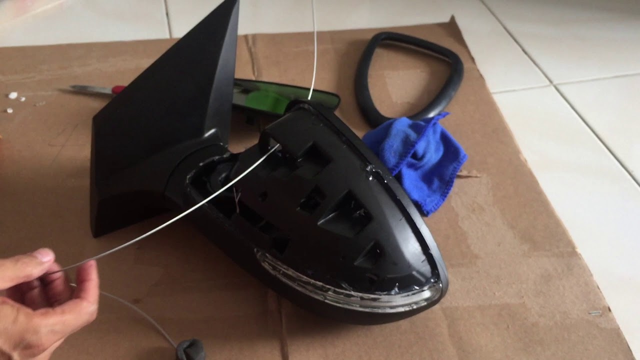 Asegurar partes de retrovisor electrico chevrolet Sonic