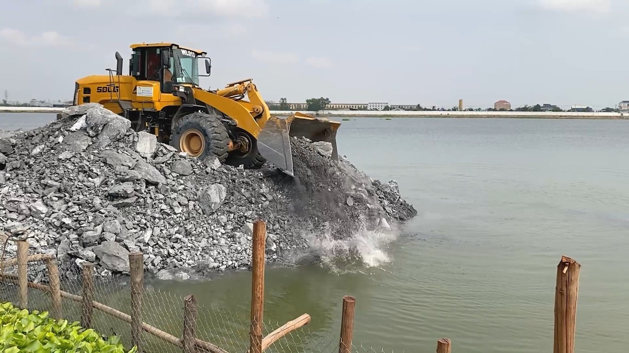 Project Showing Action by Bulldozer Pushing 56