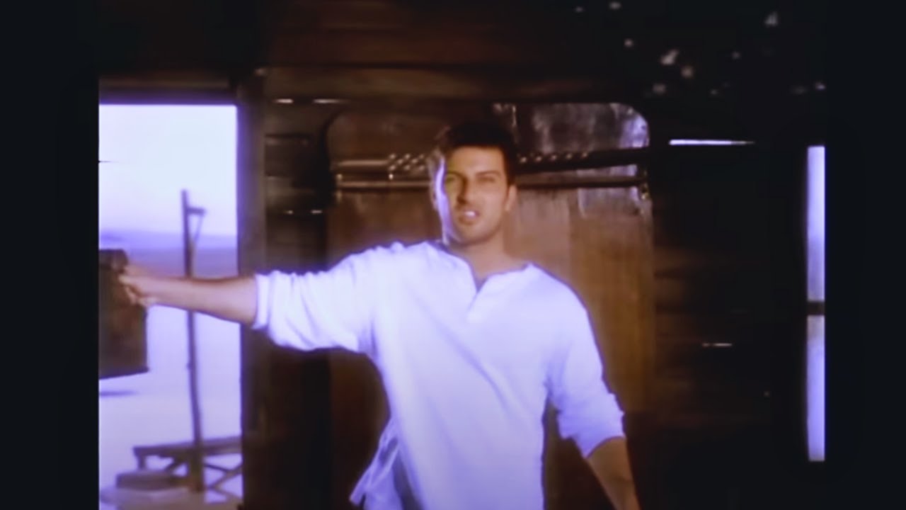 TARKAN - İkimizin Yerine (Official Music Video)