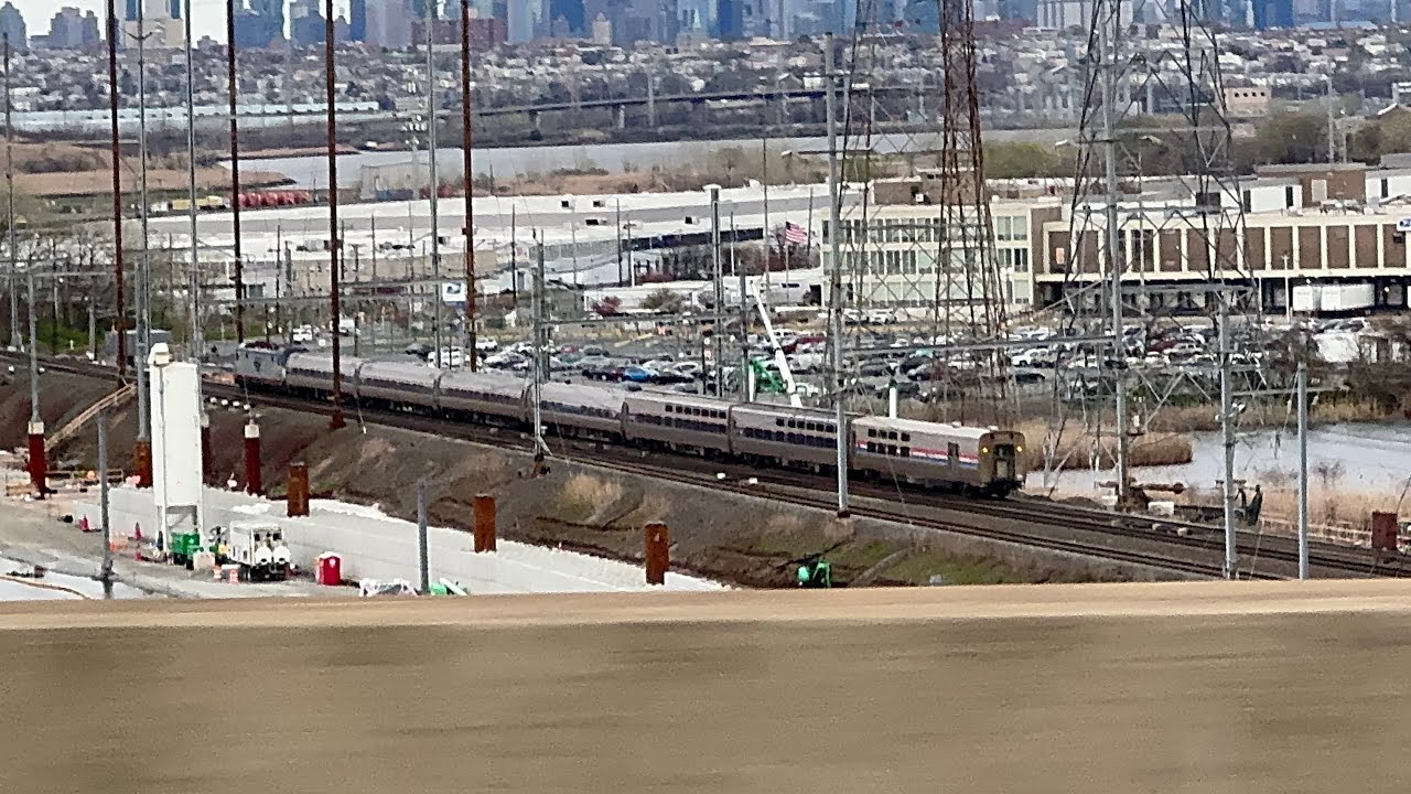 Amtrak Trains passing by the Construction of the Brand New Portal North Bridge