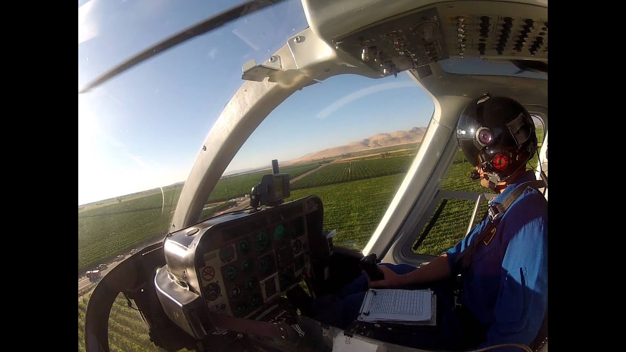 Bell 407 Air Ambulance helicopter landing at scene