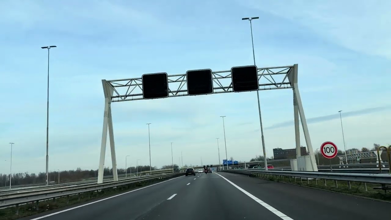 Drive from Belgium to Amsterdam. ( Netherland)