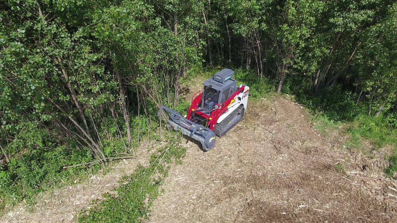 Loftness VMLogix TimberAx mulching Head on Takeuchi (raw footage) 160726 2