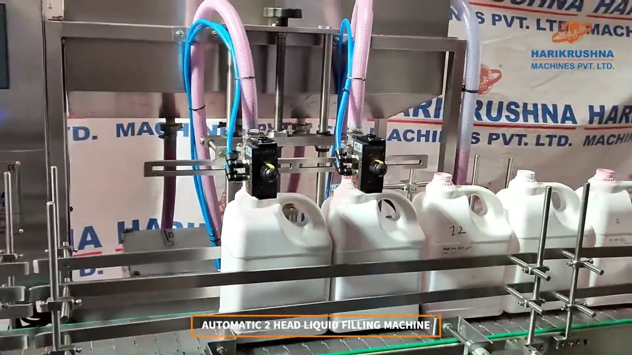 AUTOMATIC 2 HEAD SERVO LIQUID FILLING MACHINE FOR 2 LTR TO 10 LTR JARS