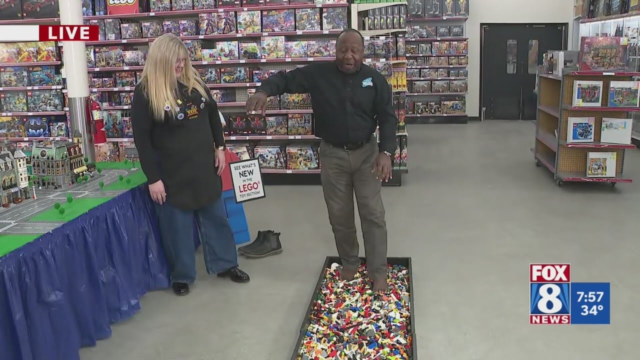 Kenny walks on Legos