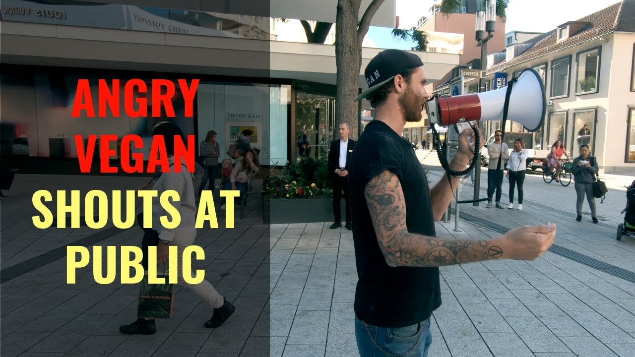 ANGRY VEGAN SHOUTS AT PUBLIC